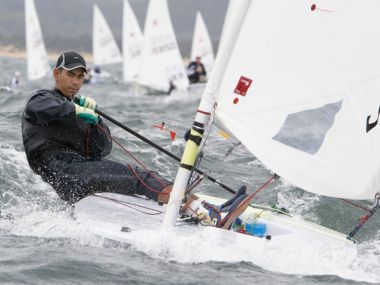 Japanese sailor heading out to the start